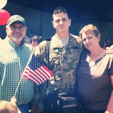Steve Hilbun Returning Home from Afghanistan Deployment in 2012 Steve Hilbun in Army uniform with his parents during his homecoming from Afghanistan in 2012.