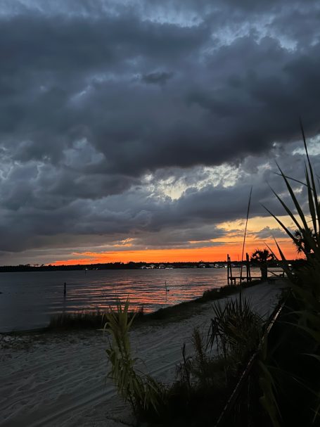 Sunset Near Ono Island on the Alabama Gulf Coast Sunset over the water near Ono Island along the Alabama Gulf Coast.