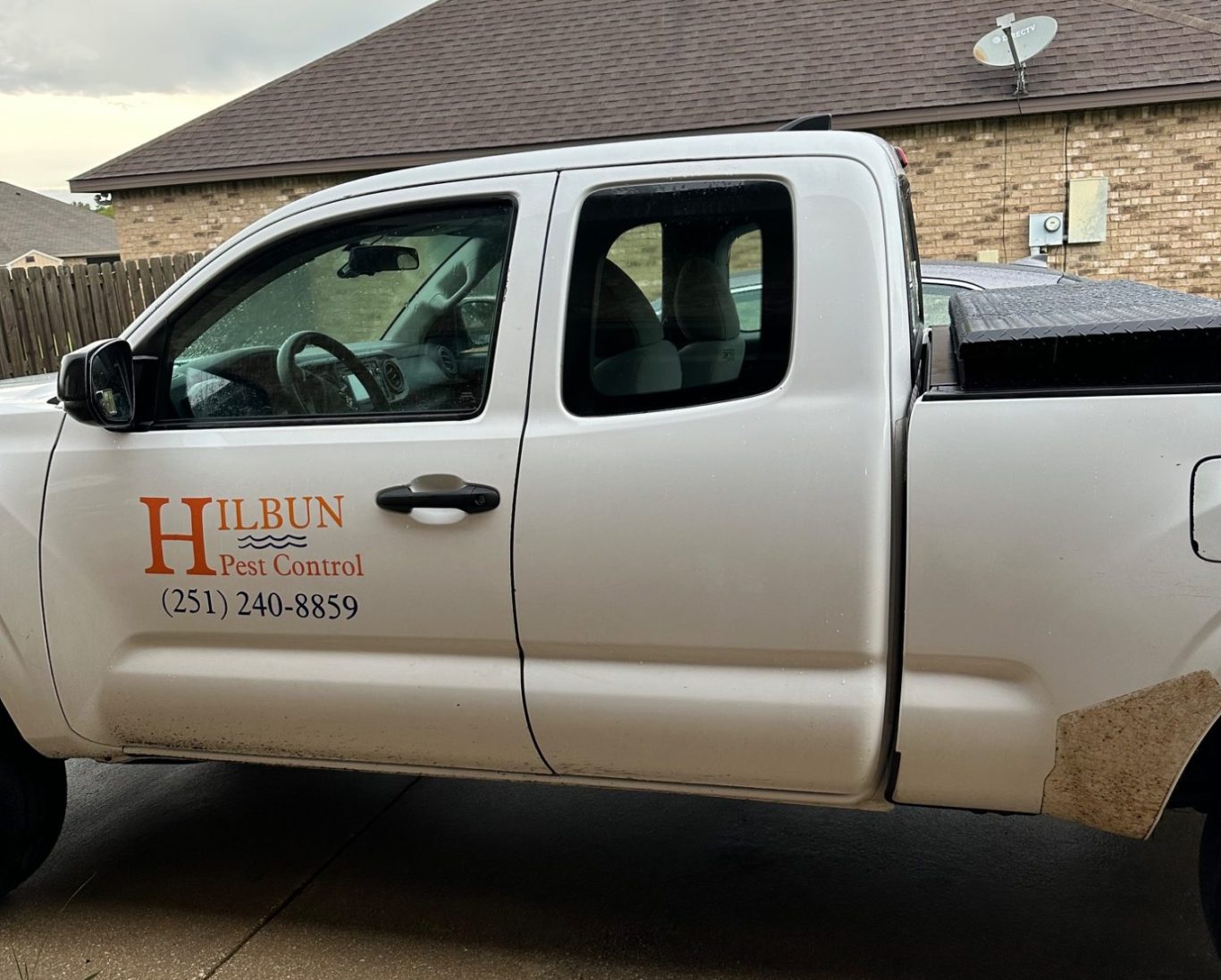 Hilbun Pest Control Truck – Local Pest Control Services in Alabama and Louisiana Hilbun Pest Control service truck parked at residential home providing pest control services in Alabama and Louisiana