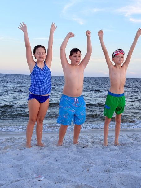 Family Beach Day at Cotton Bayou in Orange Beach, Alabama Children enjoying the beach at Cotton Bayou in Orange Beach, Alabama.